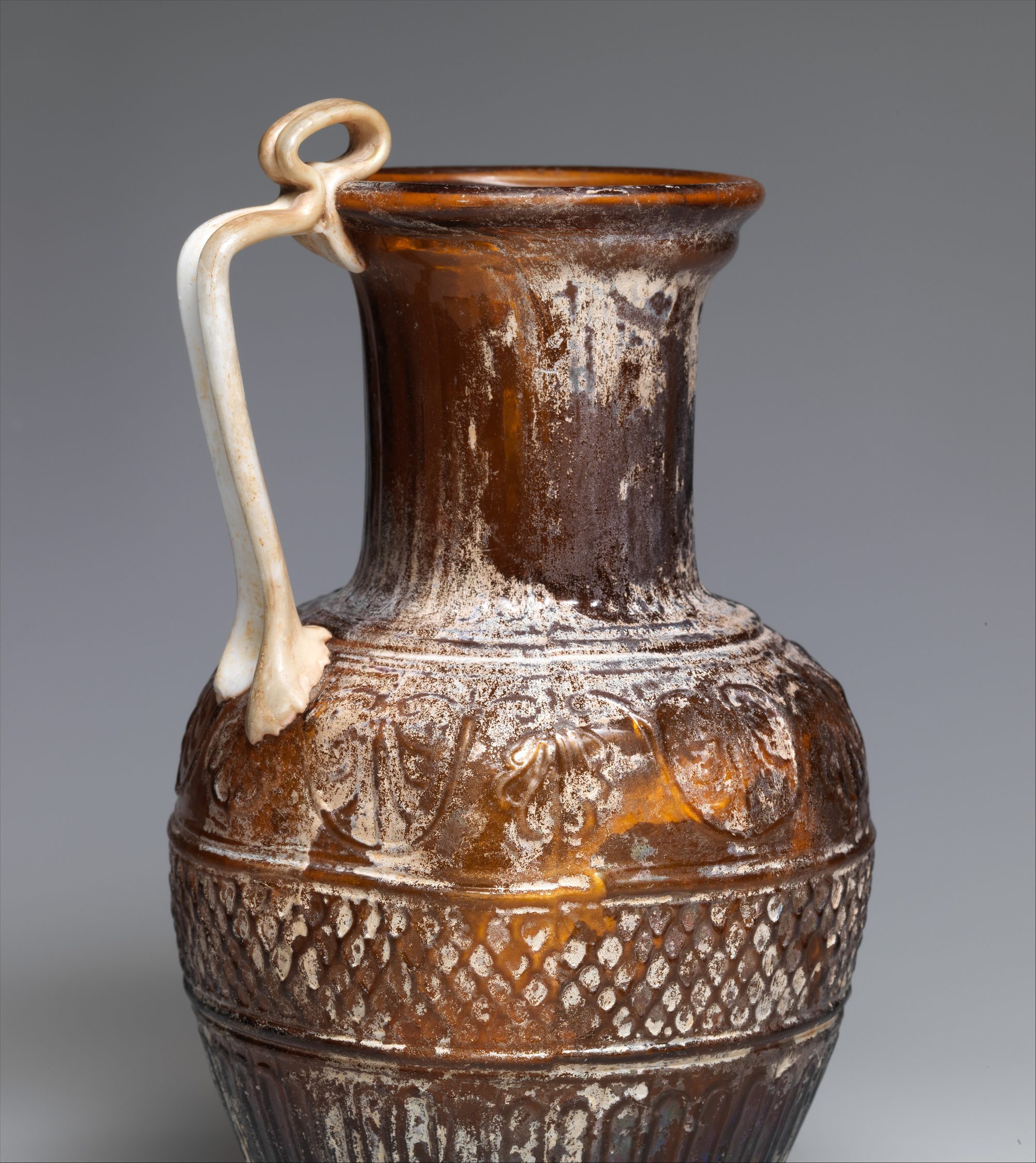Roman mould-blown glass jug signed by Ennion, first half of the first century CE.
