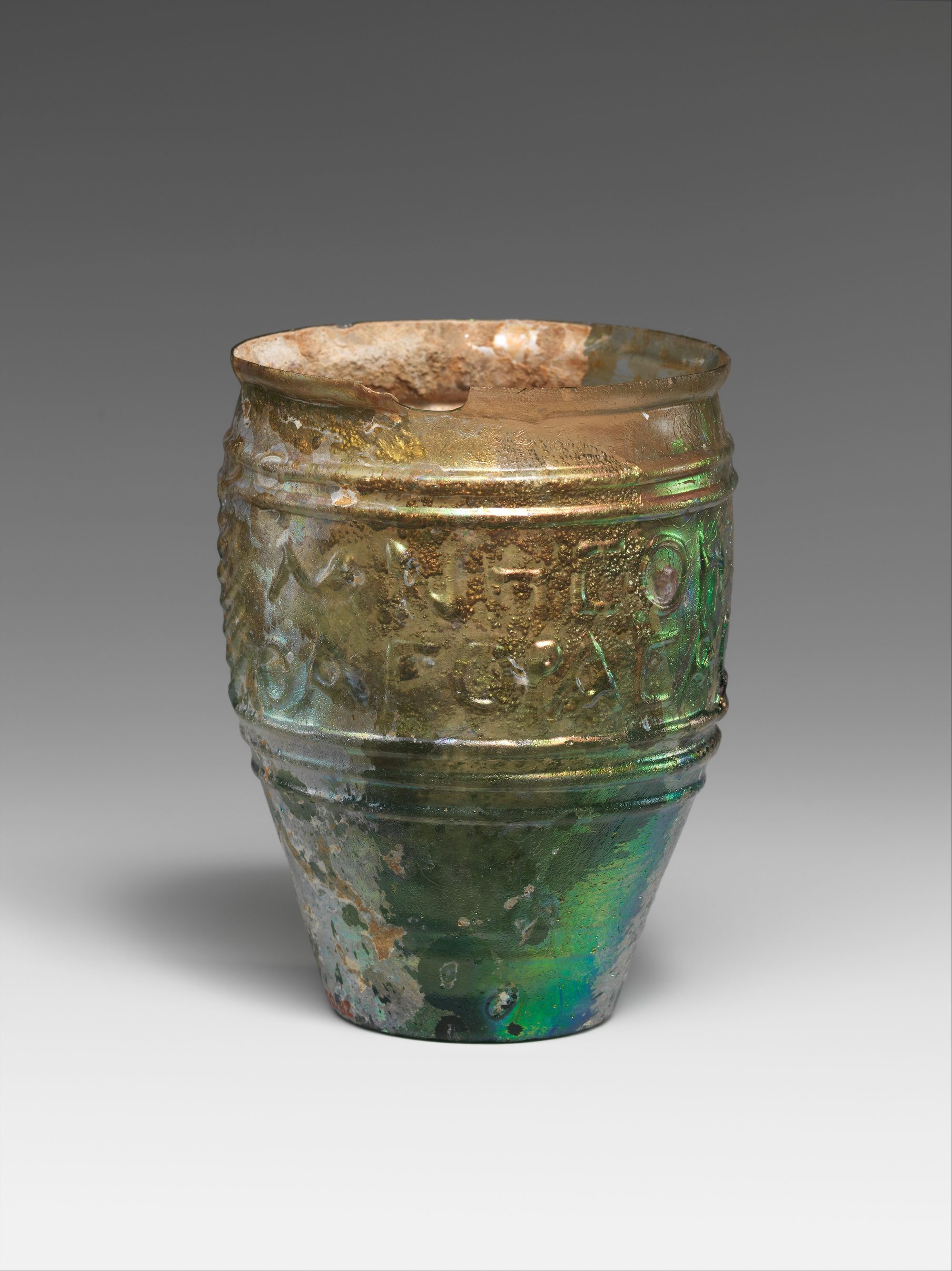 Roman mould-blown glass beaker signed by Jason, mid first century CE.